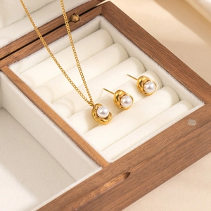 Lava texture gold pearl jewelry set including necklace and stud earrings in a wooden box