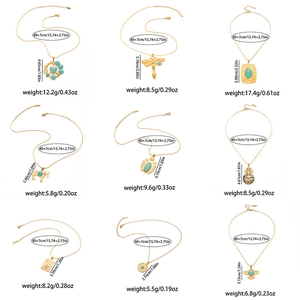 Set of bohemian gold necklaces with irregular heart, dragonfly and turquoise pendants