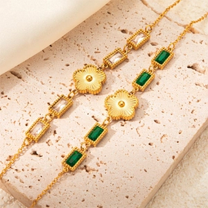 Vintage gold-plated titanium steel bracelet with emerald green and white crystal gems