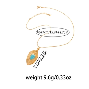 Detail of gold leaf pendant with turquoise stone and lobster clasp on 40cm snake chain