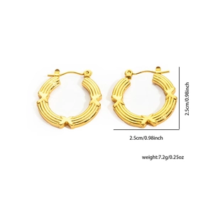 Detail of 18K gold-plated chain hoop earrings with textured finish and X-shaped cross design