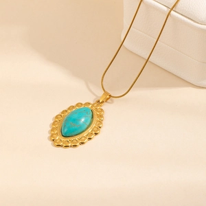 Collana vintage in acciaio inossidabile con pietra turchese e cornice a onde