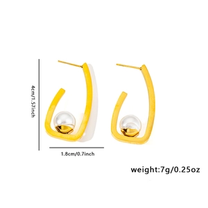 Detail view of 18K gold-plated butterfly earrings with dimensions 4cm by 1.8cm
