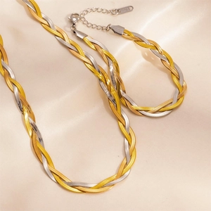 Detail of tricolor braided stainless steel jewelry set with lobster clasp and tag