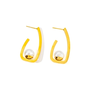 Elegant gold U-shaped geometric stud earrings with white bead inlay on white background