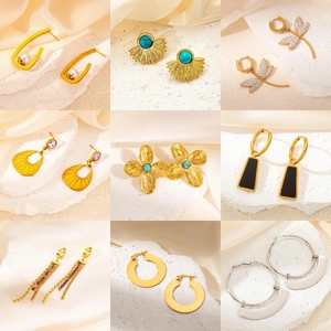 Collection of nine gold-plated stainless steel earrings with pearls and gemstones