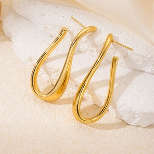 Polished 18K gold-plated titanium steel U-shaped hoop earrings on elegant stone props