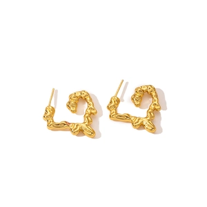 Golden 18K plated titanium steel earrings with abstract lava texture heart design
