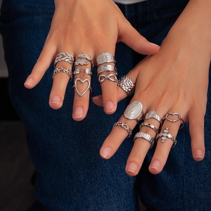 15pcs silver bohemian stacking rings set featuring heart, feather and cross motifs