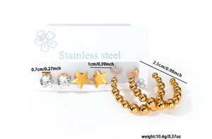 Ensemble de trois paires de boucles d'oreilles en acier avec étoiles dorées et cristaux