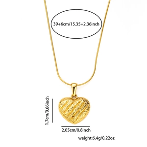 Macro shot of 18k gold plated heart pendant necklace showing dimensions and 39cm length