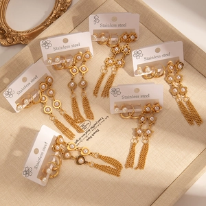 Ensemble de boucles d'oreilles dorées en acier inoxydable avec perles et pompons