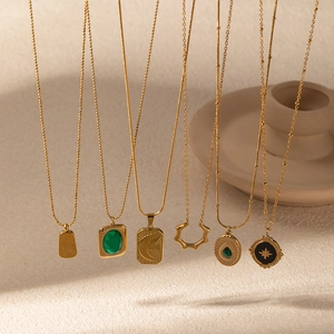 Collection of gold titanium steel necklaces with geometric heart and star star pendants