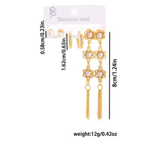 Détail du lot de boucles d'oreilles avec perles et pendants étoiles à pampilles
