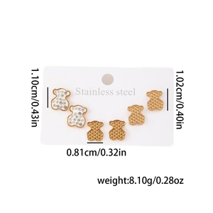 Détails de trois paires de boucles d'oreilles ours en acier inoxydable doré avec strass