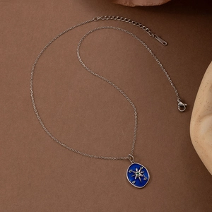 Starry sky pendant necklace with blue enamel and octagonal star on silver chain