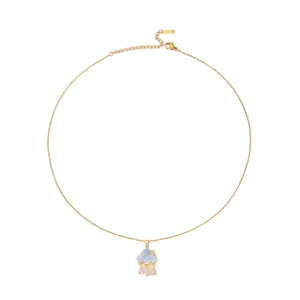 Detail of blue cloud pendant with tassels on a gold stainless steel necklace