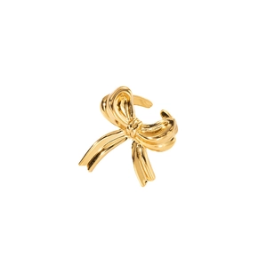 Polished gold ribbon bow ring in stainless steel with a minimalist open adjustable band