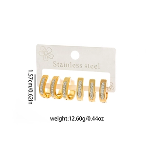 Minimalist U-shaped gold stainless steel earrings set with sparkling crystals and display card