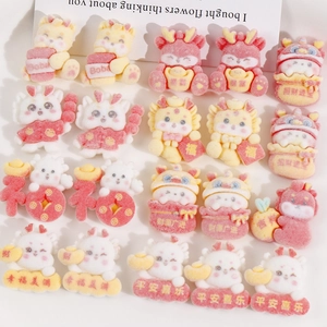 Detailed view of Chinese New Year resin dragon charms with festive flocking texture