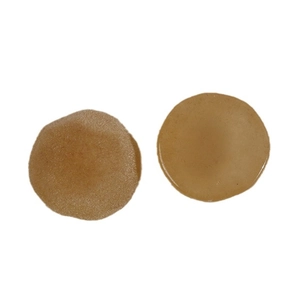 Pair of round silicone nipple covers with seamless thin edges and natural skin tone