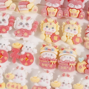 Detailed view of DIY resin charms with cartoon dragons and lion dance motifs for crafts