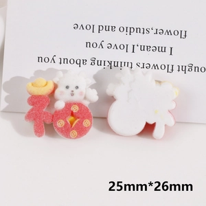 Detailed macro view of 25mm red lucky charm DIY resin flatback for jewelry craft