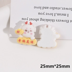 Detail view of cartoon dragon resin charms with 25mm size and 3D flocking texture