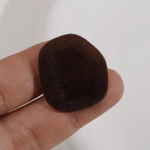 Close-up of a burgundy flocked resin geometric patch for DIY jewelry making accessories