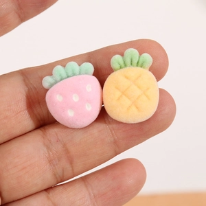Miniature flocked fruit charms in strawberry and pineapple shapes for DIY jewelry making