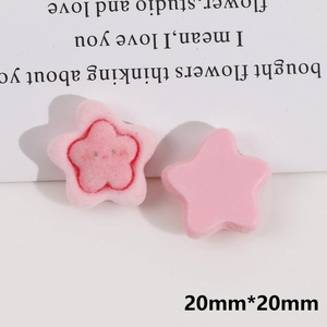 Detailed view of pink flocking star DIY accessory with a cute smile face design