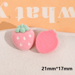 Macro detail of 21x17mm flocked strawberry resin patch for DIY hair accessories