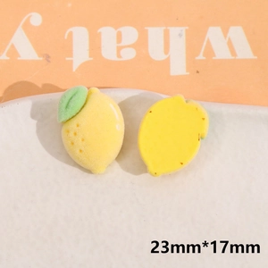 Macro detail of flocked lemon resin charm with 23mm*17mm dimensions and flat back for DIY