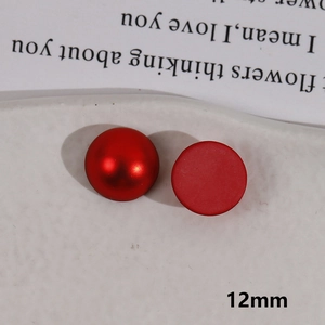 Macro shot of 12mm red matte resin charms for DIY jewelry and hair accessories