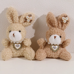 Cute plush rabbit figurines with pearl heart accessories in beige and brown styles
