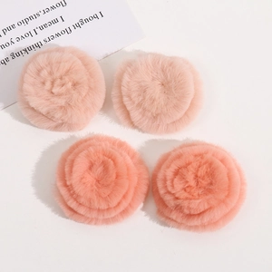 Set of four 4cm soft plush flower accessories in shades of pink for DIY hair decorations