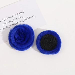 Detail of 4cm royal blue plush flower accessory with black non-woven base for DIY crafts