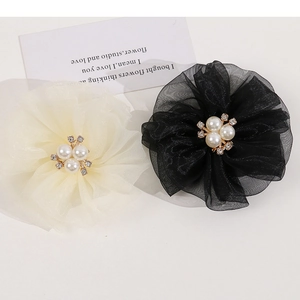 Elegant mesh flower hair clips in black and cream white with pearls and rhinestones