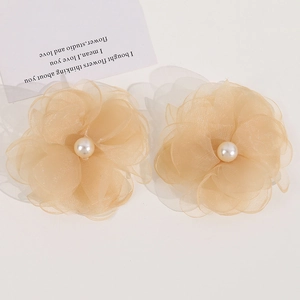 Set of two apricot organza layered flower hair clips with central white pearl accents