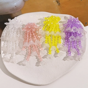 Handmade Lily of the Valley beaded tassel hair accessories in four vibrant colors