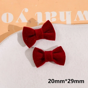 Detailed close-up showing 20mmx29mm burgundy plush velvet bow accessories for DIY hairpins