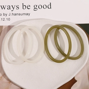 Minimalist large resin oval hoop earrings in cream white and olive green 4-piece set