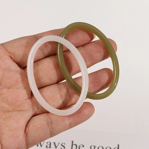 Exaggerated geometric resin oval hollow earrings in cream white and olive green