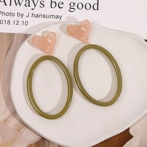 Exaggerated geometric resin oval hoop earrings with pink heart studs in green and pink