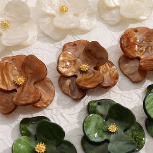 DIY multi-layer acrylic flower charms with marble texture and golden center accents