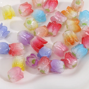 Macro shot of colorful glitter resin tulip beads for DIY earring and jewelry making