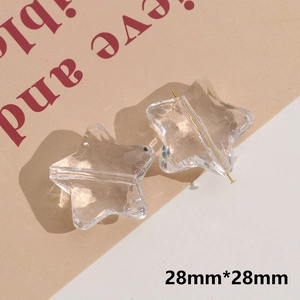 Detailed view of faceted 28mm transparent acrylic star bead with central hole for DIY jewelry