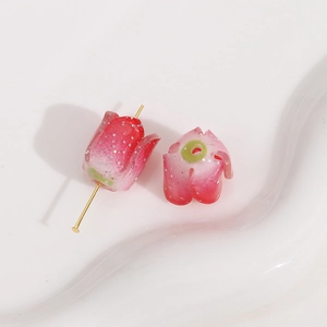 Macro view of realistic resin tulip beads with glitter for DIY jewelry making