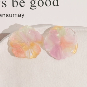 Accesorios para horquillas florales en degradado rosa y amarillo con acabado perlado