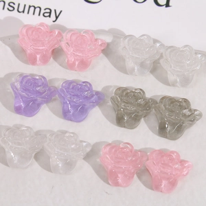 Macro view of translucent resin flower charms in assorted colors for DIY jewelry making